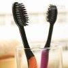 $wholesale-4-pieces-lot-bamboo-toothbrush.jpg