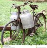 $rusty-old-bike-milkman-two-old-milk-cans-broken-very-alluminium-saddle-44831528.jpg