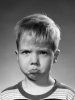 $1950s-portrait-blond-boy-sad-grumpy-angry-pouting-facial-expression.jpg