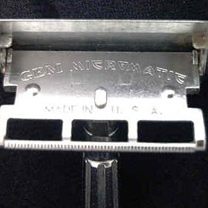 The inside of the blade holder of a GEM Micromatic Single Edge Razor
