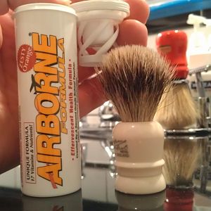 Airborne container brush holder