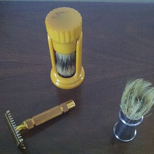 1930s Gillette NEW razor, Ever-Ready butterscotch with stand, and a no-name metal-handled shaving br