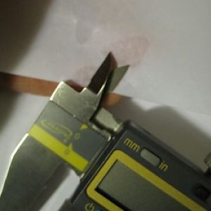 Cleaning Digital Caliper Inside Measuring Surfaces with Isopropyl Alcohol on Paper