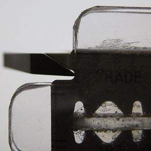 DE Razor Blade Recessed Length Measurements - Close-Up of Caliper Contact with Blade