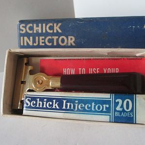 Uncommon Crimson Schick Injector